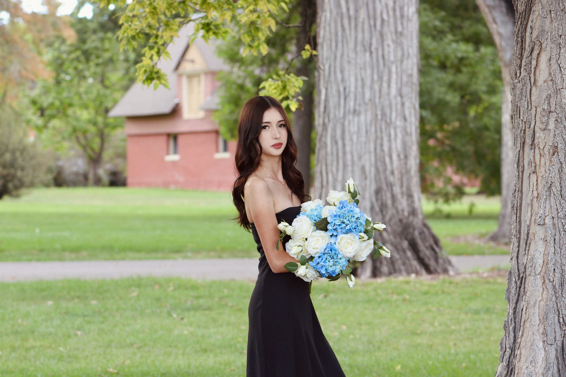 Floral storytelling — bridesmaid with blue and white bouquet